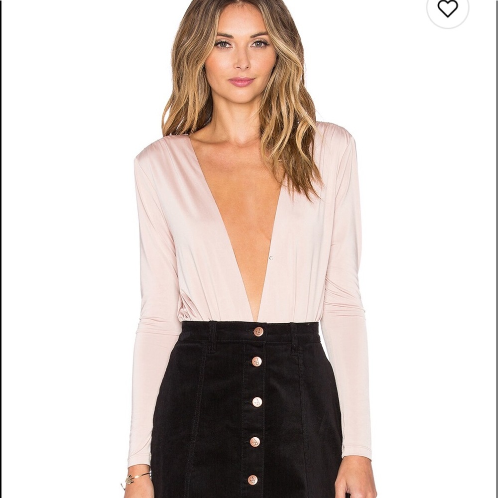 X Revolve Tension bodysuit